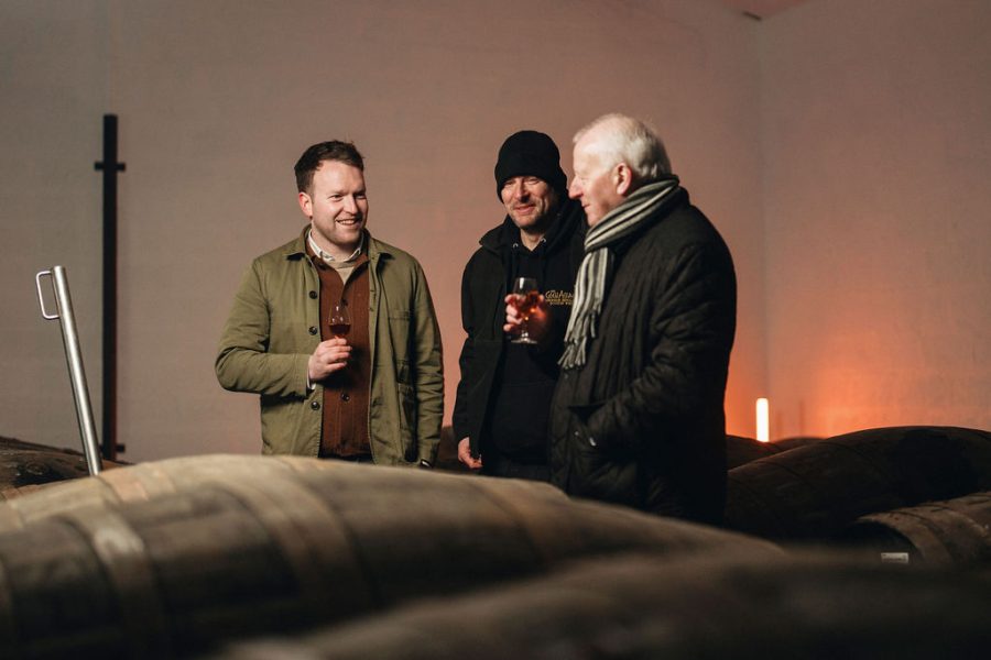 Ronan Currie, Lindsay Comrie and Billy Walker, taking samples from casks